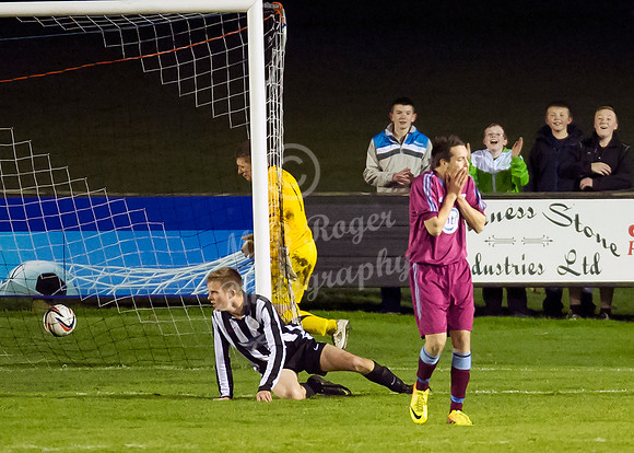 Highland League (SHFL) football match Wick Academy FC and Keith FC played at Harmsworth Park Wick home of the Scorries.  Wick fans show their delight as Keith's Sam Smith covers his face in horror as