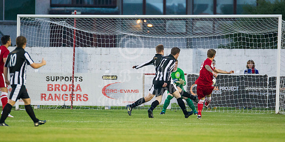 Brora 6 v Wick 2  012 p _MDR3868 Zander Sutherland shooting past James More - goal Brora
