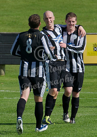 Wick 3 v Fraserburgh 0   004 p_MDR1890 Gary Weir Stevie Cunningham celebrating with Davie Allan