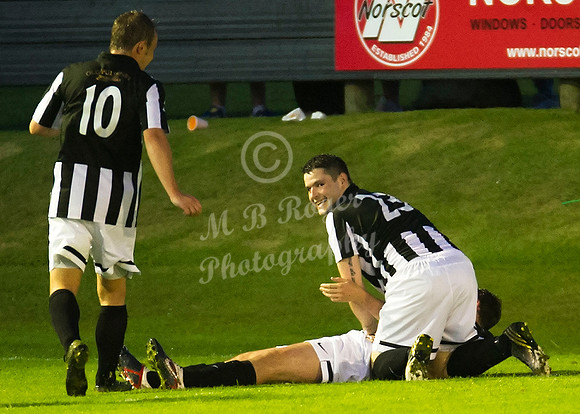 Wick - Sam Mackay and Richard MacAdie celebrate with Bryan McKiddie