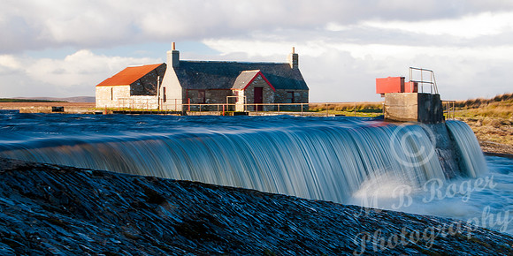 Water flowing over the Dam at Loch More