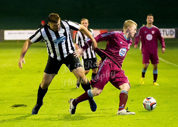Highland League (SHFL) football match Wick Academy FC and Keith FC played at Harmsworth Park Wick home of the Scorries.  Wick's Lukasz Geruzel ensuring Craig Phillips of Keith does not get away