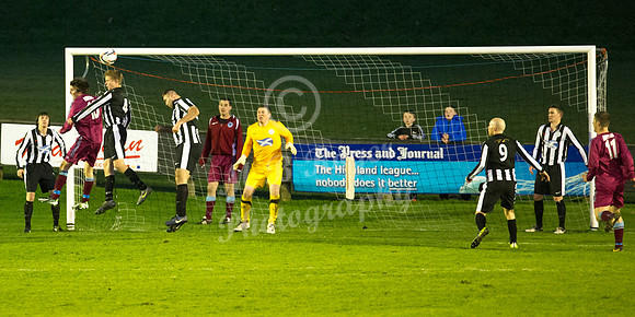 Highland League (SHFL) football match Wick Academy FC and Keith FC played at Harmsworth Park Wick home of the Scorries.  Clearing header by Wick's Alan Farquhar