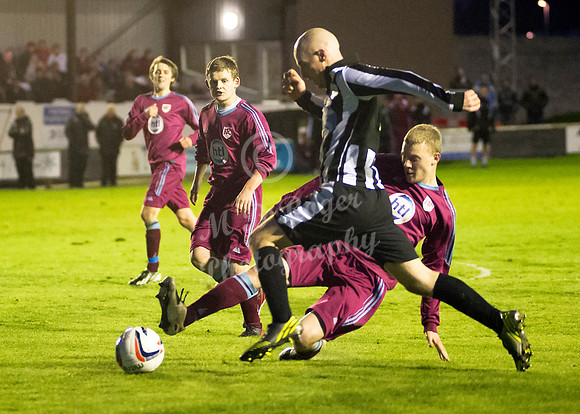 Highland League (SHFL) football match Wick Academy FC and Keith FC played at Harmsworth Park Wick home of the Scorries.  Keith's Craig Phillips stretches in an attempt to beat Wick's Gary Weir to the