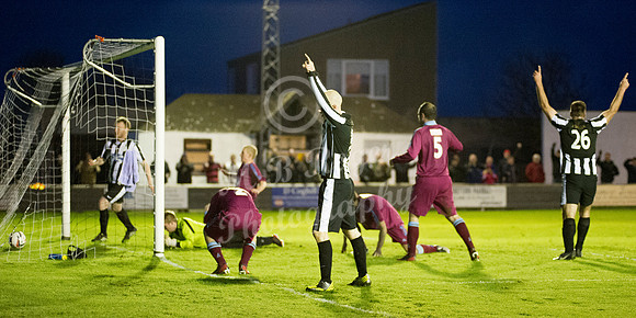 Highland League (SHFL) football match Wick Academy FC and Keith FC played at Harmsworth Park Wick home of the Scorries.  Wick's Gary Weir and Lukasz Geruzel celebrate while Keith's Zander Jack holds h
