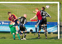 Friendly pre-season match between Wick Academy and Livingstone played at Harmsworth Park home of Highland League team Wick Academy. Wick Goal keeper James More fouled as James Pickles cleares for Acad