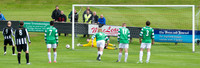 Buckie keeper Kevin Main saving penalty by Wick's Gary Weir