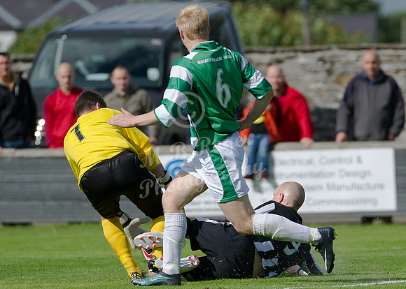 Wick Academy - Gary Weir  Buckie Thistle keeper - Kevin Main