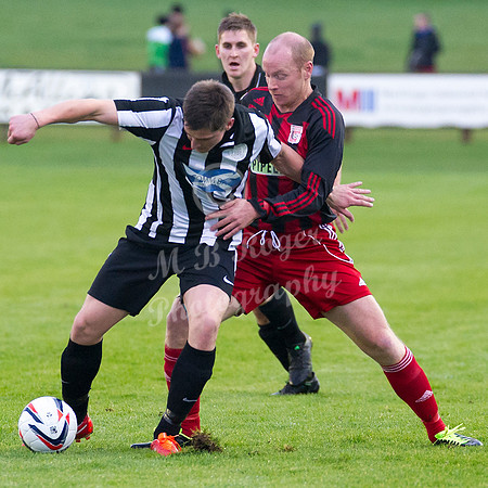 Wick Academy 2 v Inverurie 2  SHFL 23/11/2013<br/>Wick's Grant Steven shields the ball from Inverurie's Martin Bavidge