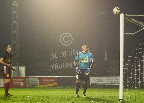 Wick 2 v Inverurie 2  SHFL 23/11/2013<br/>Inverurie keeper Andy Reid watches as Wick's Richard MacAdie's shot bounces back off the cross bar