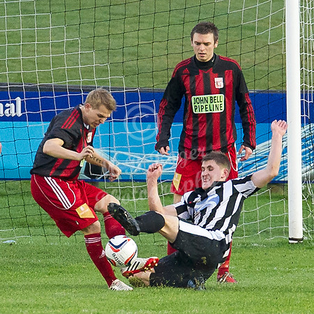 Wick 2 v Inverurie 2  SHFL 23/11/2013<br/>Inverurie's Scott Begg and Wick's Michael Steven