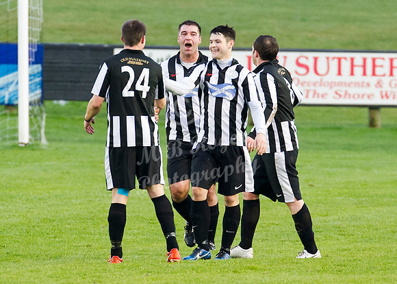 Wick 2 v Inverurie 2  SHFL 23/11/2013<br/>Grant Steven, Stevie Cunningham and Lukasz Geruzel congratulate Wick goal scorer Sam Mackay