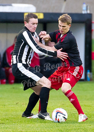 Wick 2 v Inverurie 2  SHFL 23/11/2013<br/>Inverurie's Scott Begg attempts to push away Wick's Gary Manson