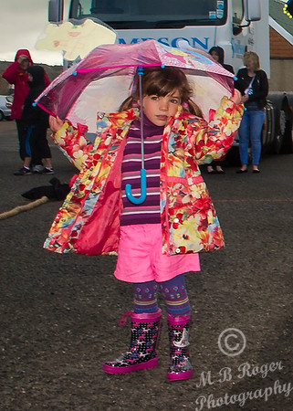 Thurso Gala Strong man - decorated Umbrella and wellie boots 17/