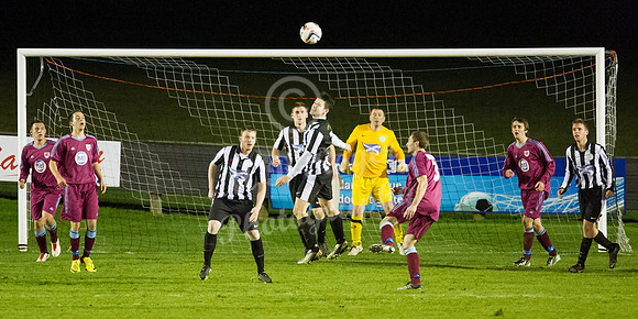 Highland League (SHFL) football match Wick Academy FC and Keith FC played at Harmsworth Park Wick home of the Scorries.  clearing header by Wick's Sam Mackay