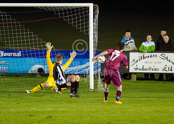 Highland League (SHFL) football match Wick Academy FC and Keith FC played at Harmsworth Park Wick home of the Scorries.  Keith's substitute Sam Smith watches as his shot heads forthe side netting wtih