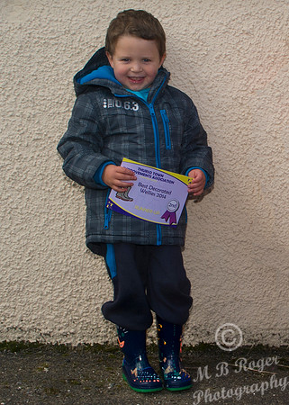 Thurso Gala Strong man - decorated Umbrella and wellie boots 17/