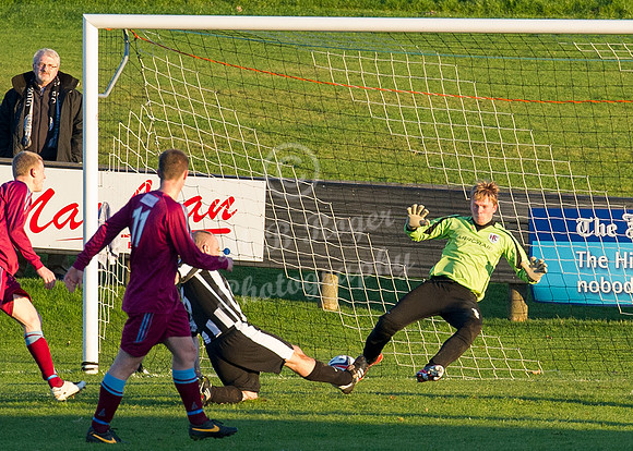 Highland League (SHFL) football match Wick Academy FC and Keith FC played at Harmsworth Park Wick home of the Scorries.  Wick Academy's Craig Shearer stretches for the ball