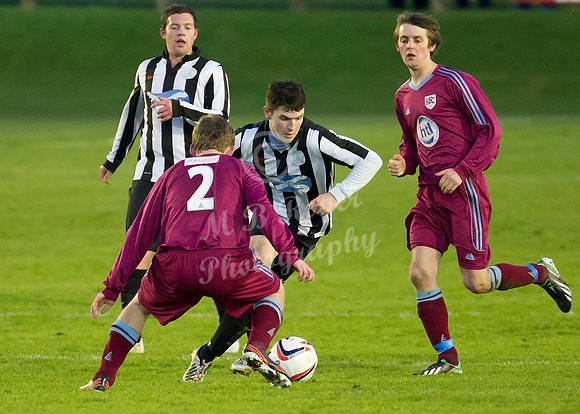 Highland League (SHFL) football match Wick Academy FC and Keith FC played at Harmsworth Park Wick home of the Scorries.  Wick's Sam Mackay bursts past Keith's Zander Jack