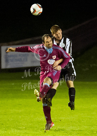 Highland League (SHFL) football match Wick Academy FC and Keith FC played at Harmsworth Park Wick home of the Scorries.  Wick's Michael Steven and Keith's Stuart Walker battle it out in the air