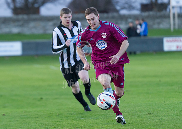 Highland League (SHFL) football match Wick Academy FC and Keith FC played at Harmsworth Park Wick home of the Scorries.  Keith's Mark Wood showing a clean pair of heels to Wick's Ross Allan