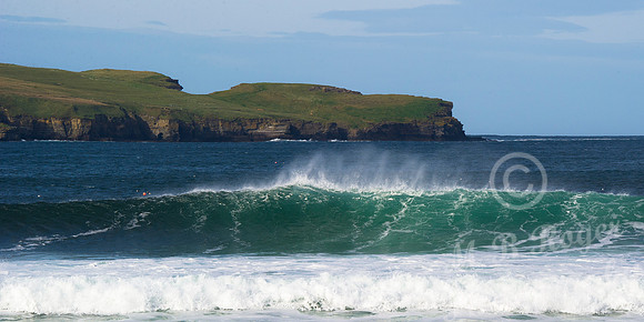 Surfing off Thurso East