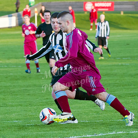 Highland League (SHFL) football match Wick Academy FC and Keith FC played at Harmsworth Park Wick home of the Scorries.  Wick's Stevie Cunningham keeps a close eye on the ball as Keith's Andrew MacAsk